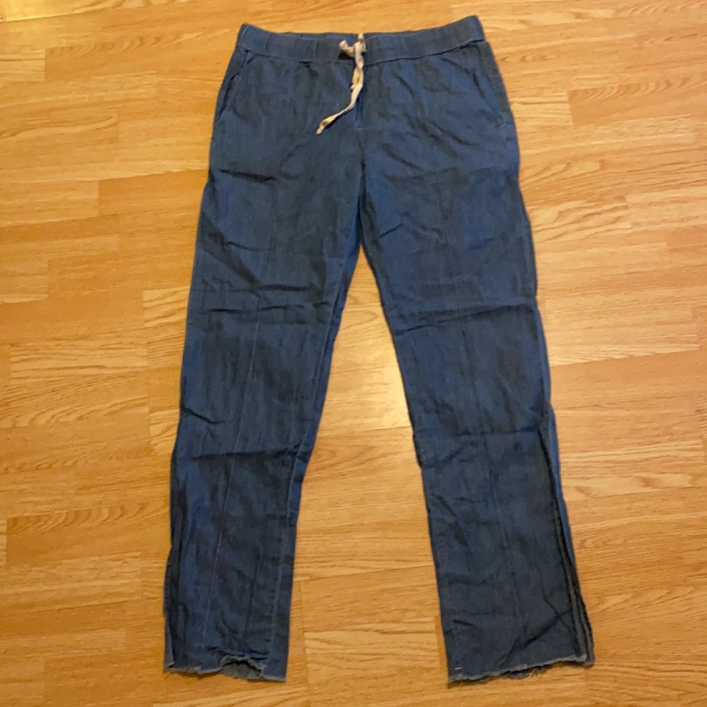 Fake jean sweatpants, slit and frilled at the bottom, white ties